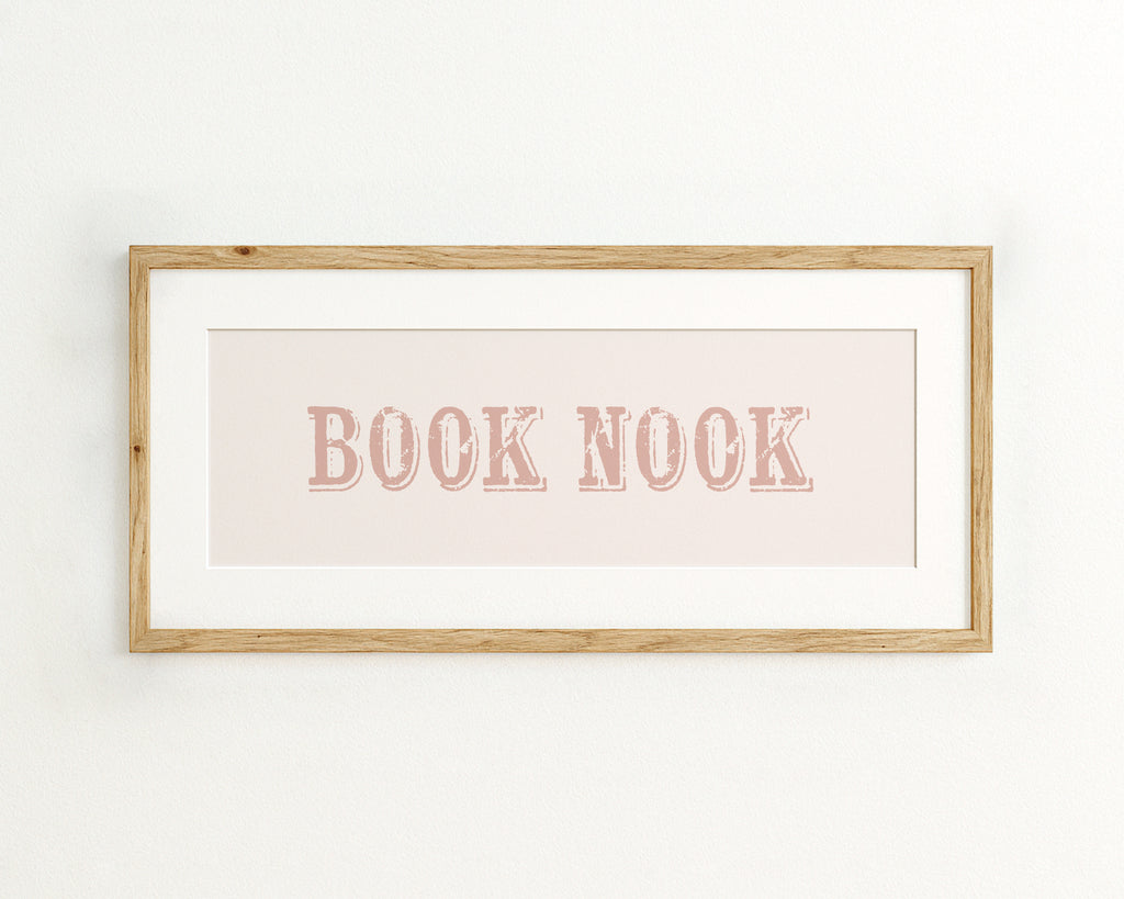 Framed print with 'BOOK NOOK' text on a light background