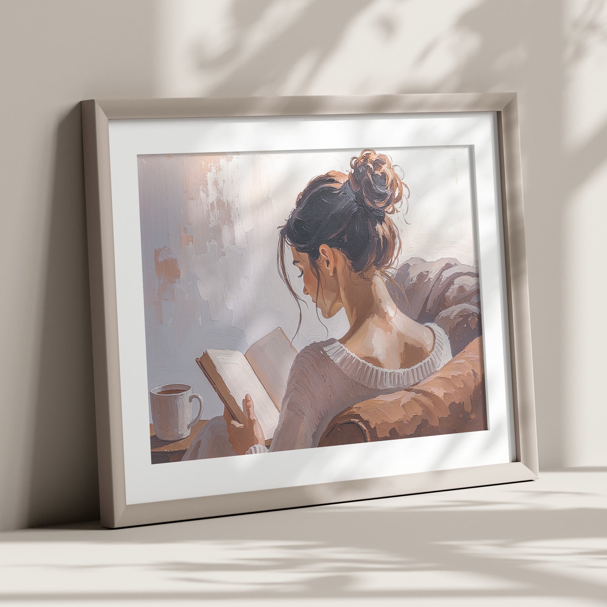 Artwork of a woman reading a book with a cup on the table next to her