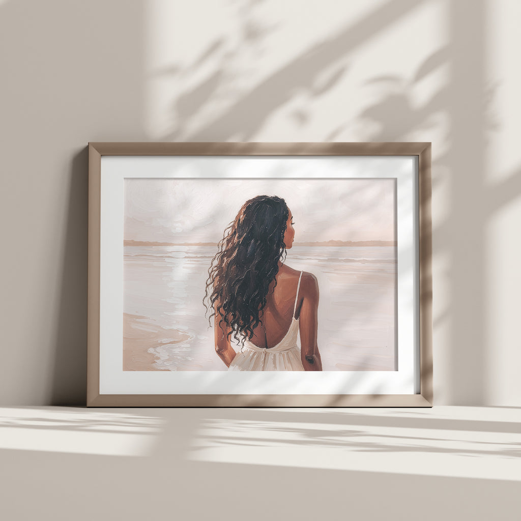 Artwork of a woman with long hair standing on a beach looking out over the water