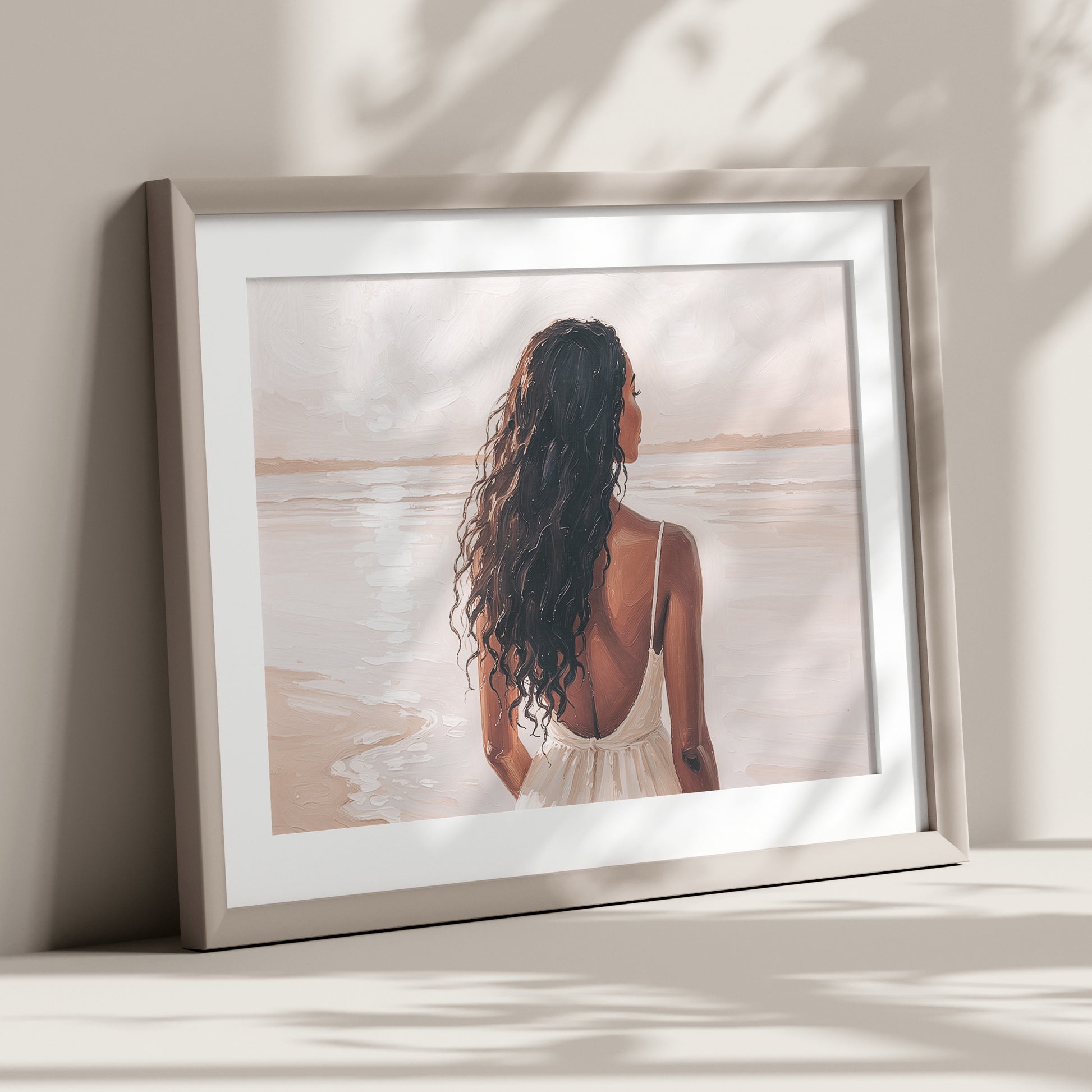 Artwork of a woman with long hair standing on a beach looking out over the water