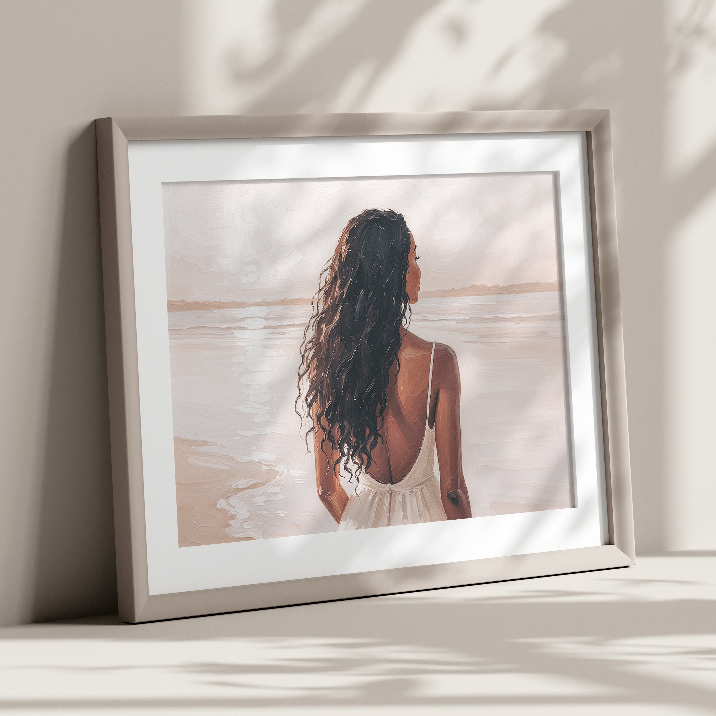 Artwork of a woman with long hair standing on a beach looking out over the water