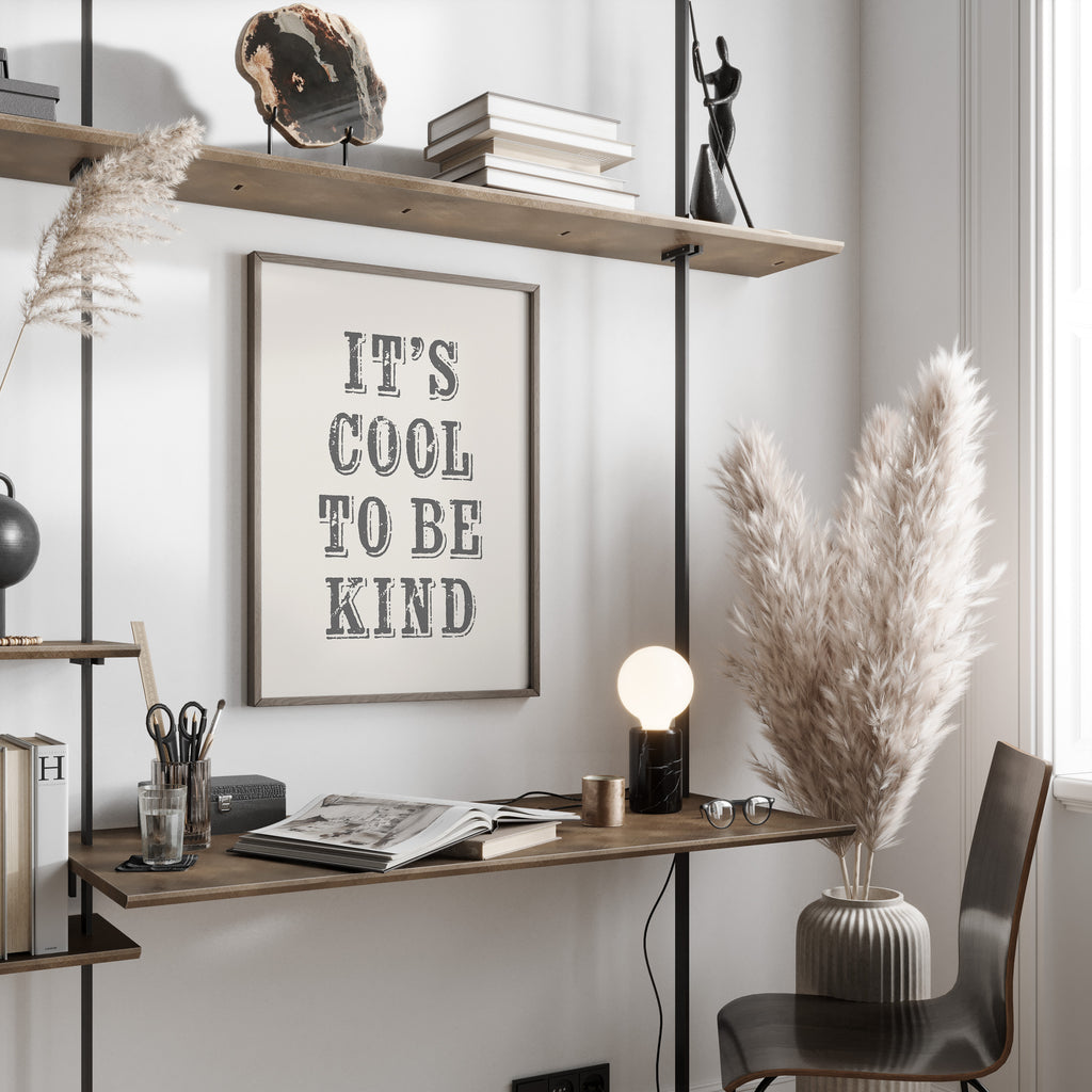 Modern office space with a desk, chair, and wall art.