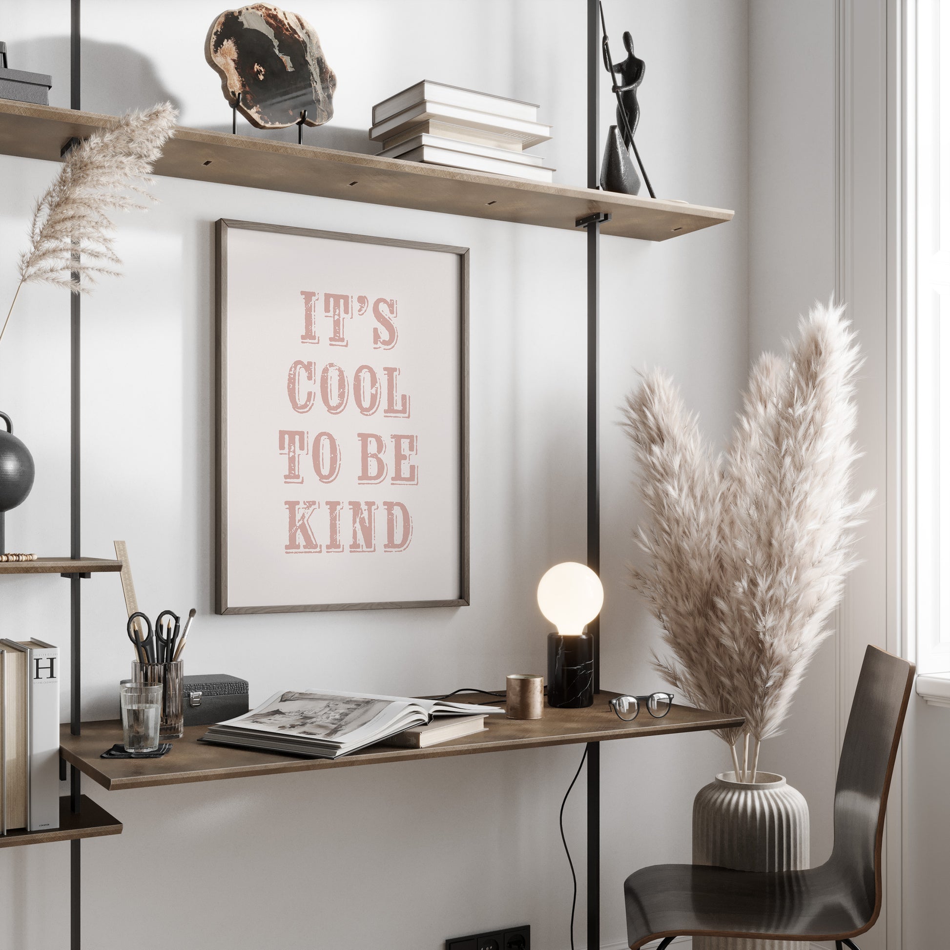 Modern home office with a desk, chair, motivational print and decorative elements.