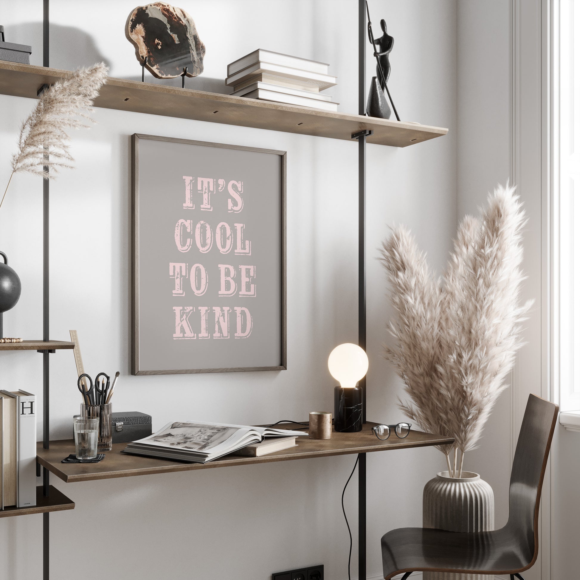 Modern home office with a desk, chair, motivational print and decorative elements.
