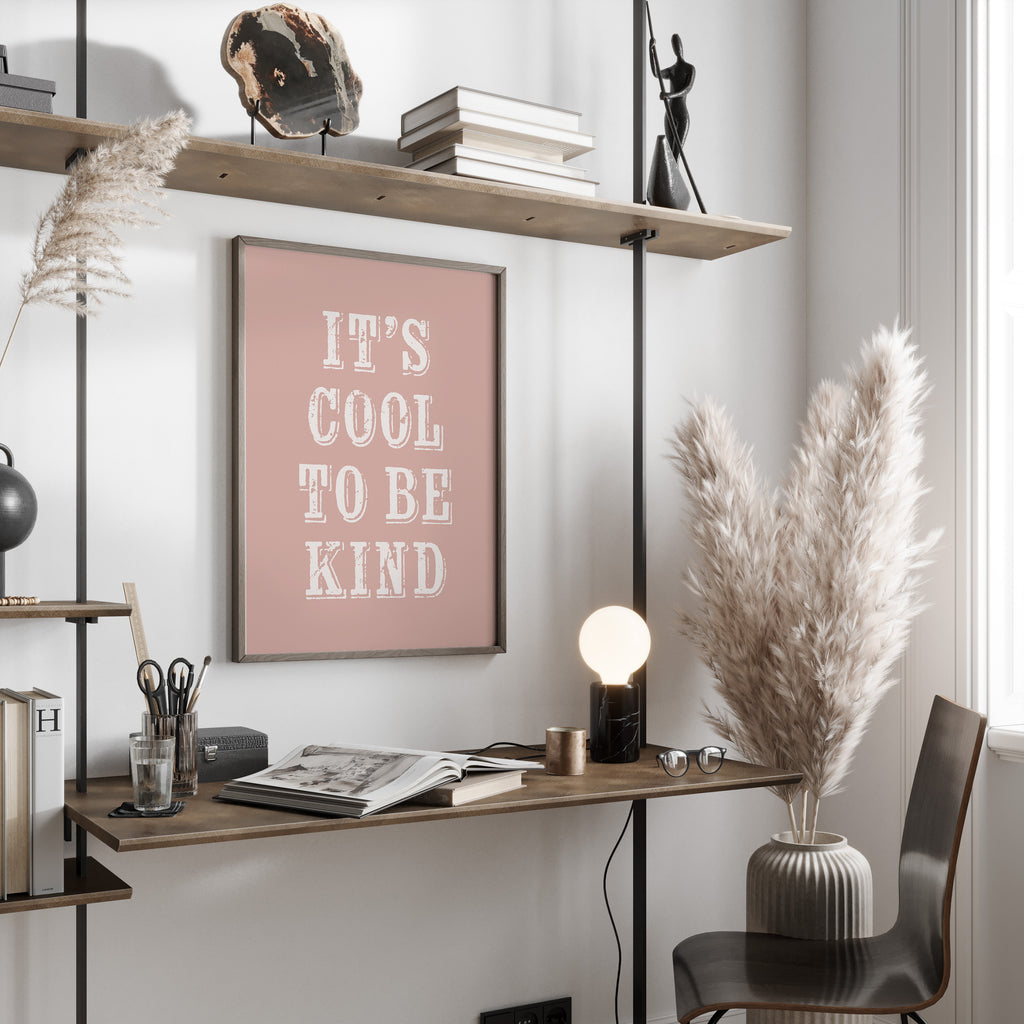 Modern home office with a desk, chair, and motivational poster on a wall.
