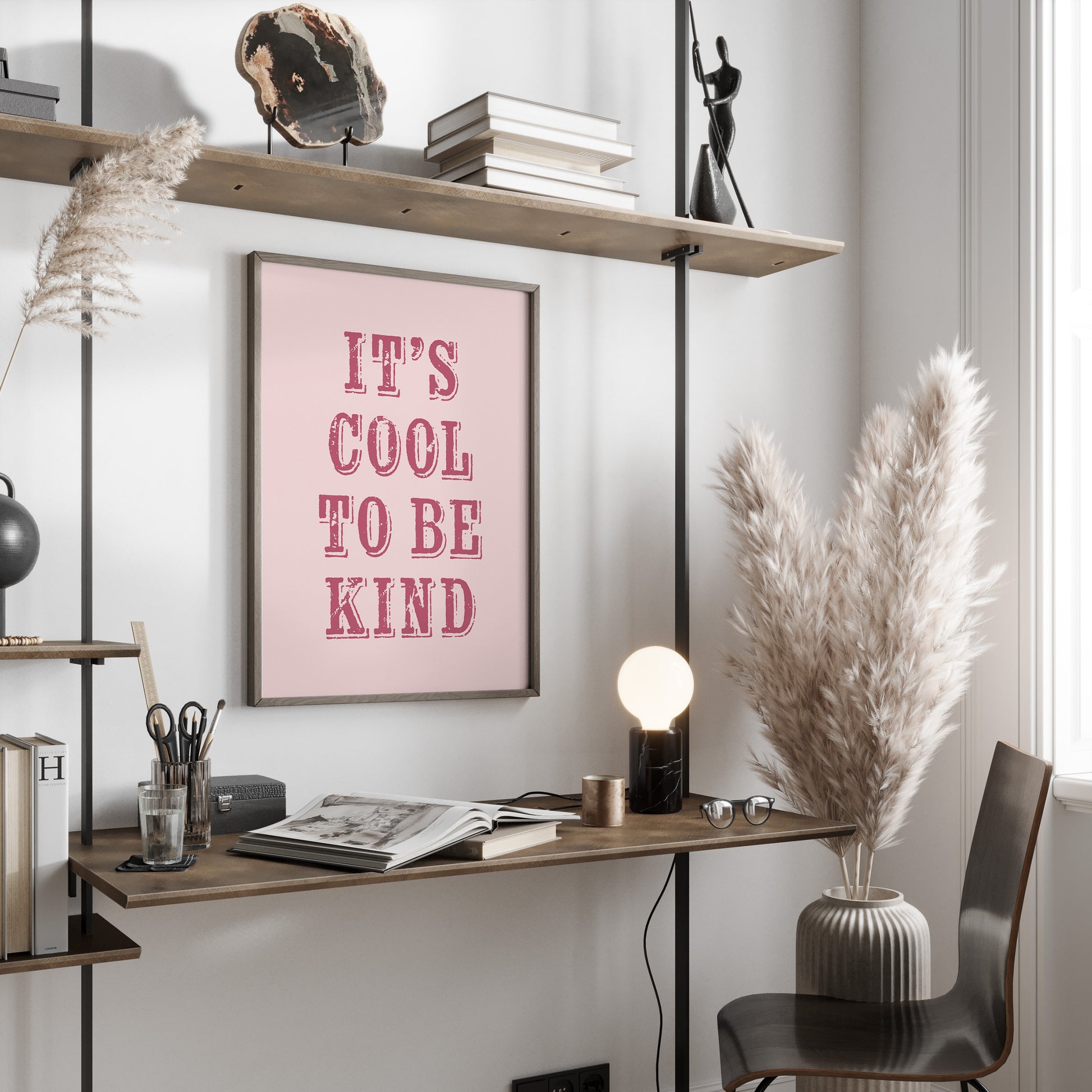 Modern office space with a desk, chair, and motivational poster on a wall.