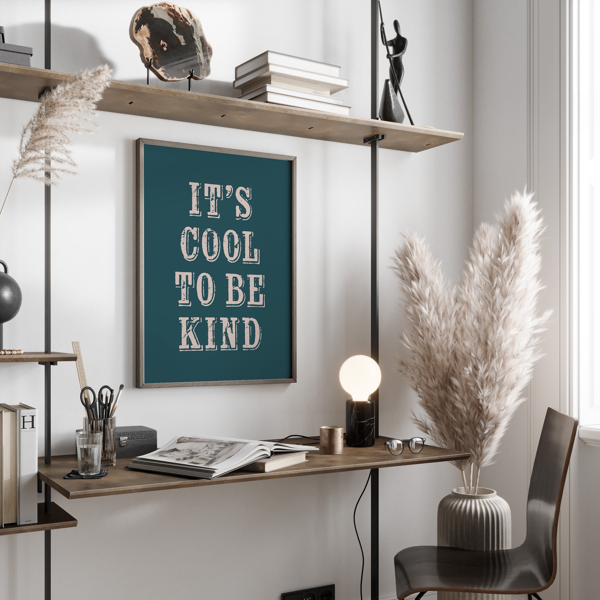 Modern office space with a desk, chair, and motivational poster on a wall.