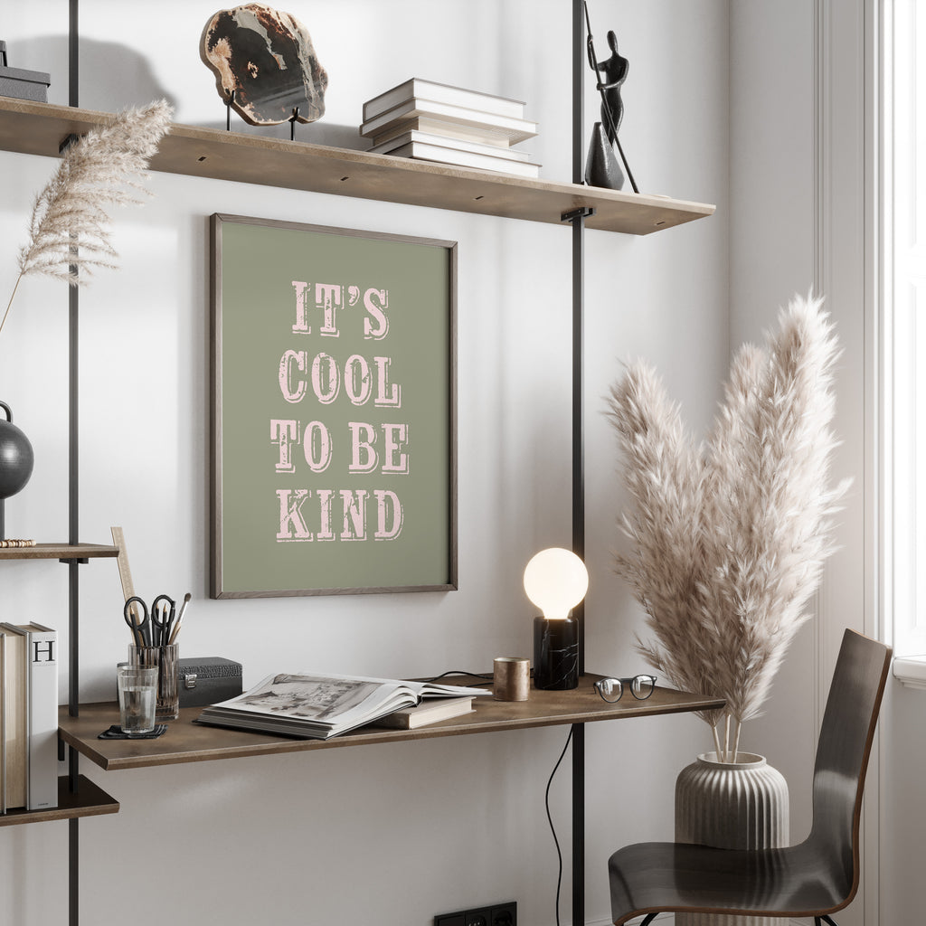 Modern office space with a desk, chair, and motivational poster on a wall.