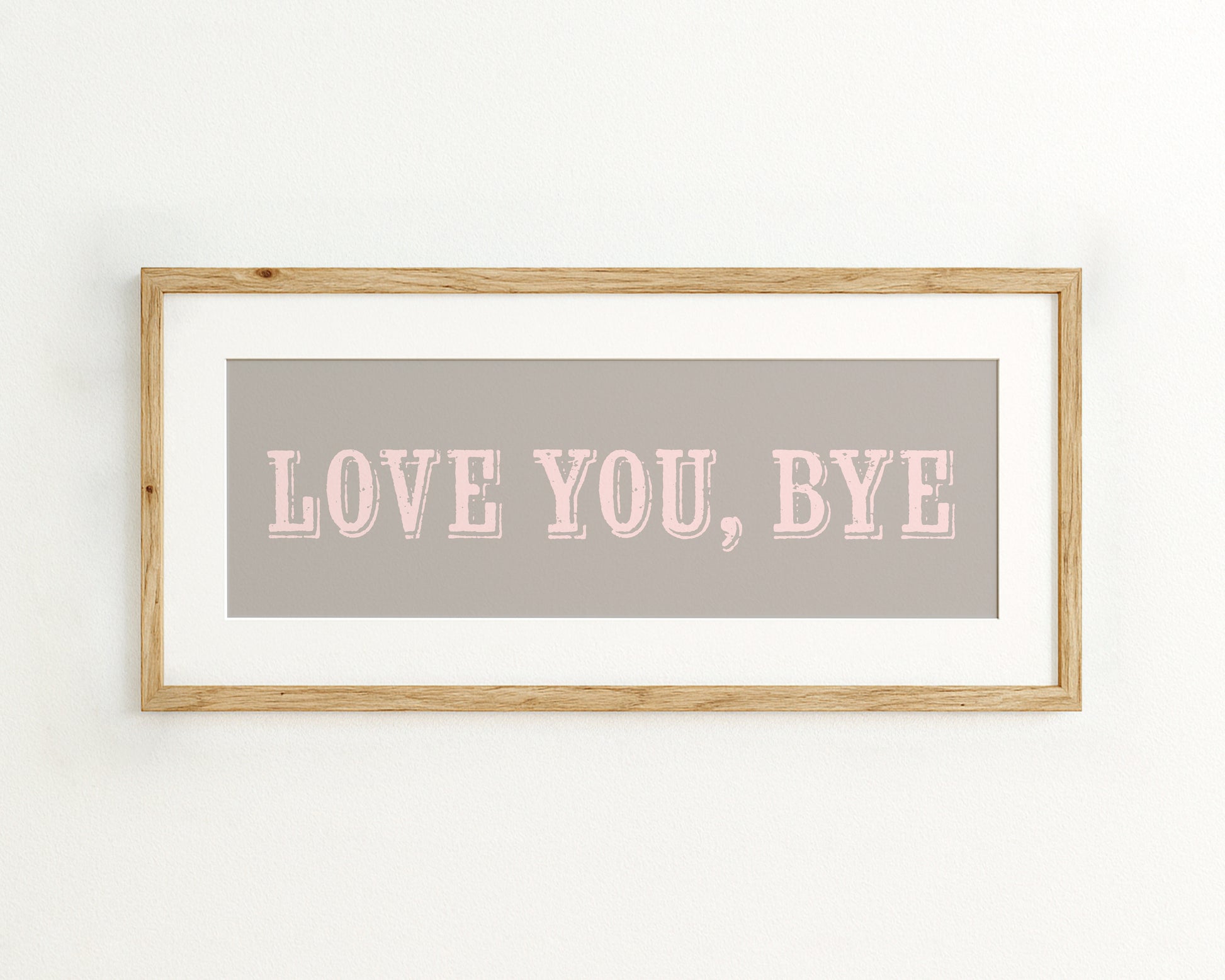 Framed artwork with 'LOVE YOU, BYE' text on a grey background