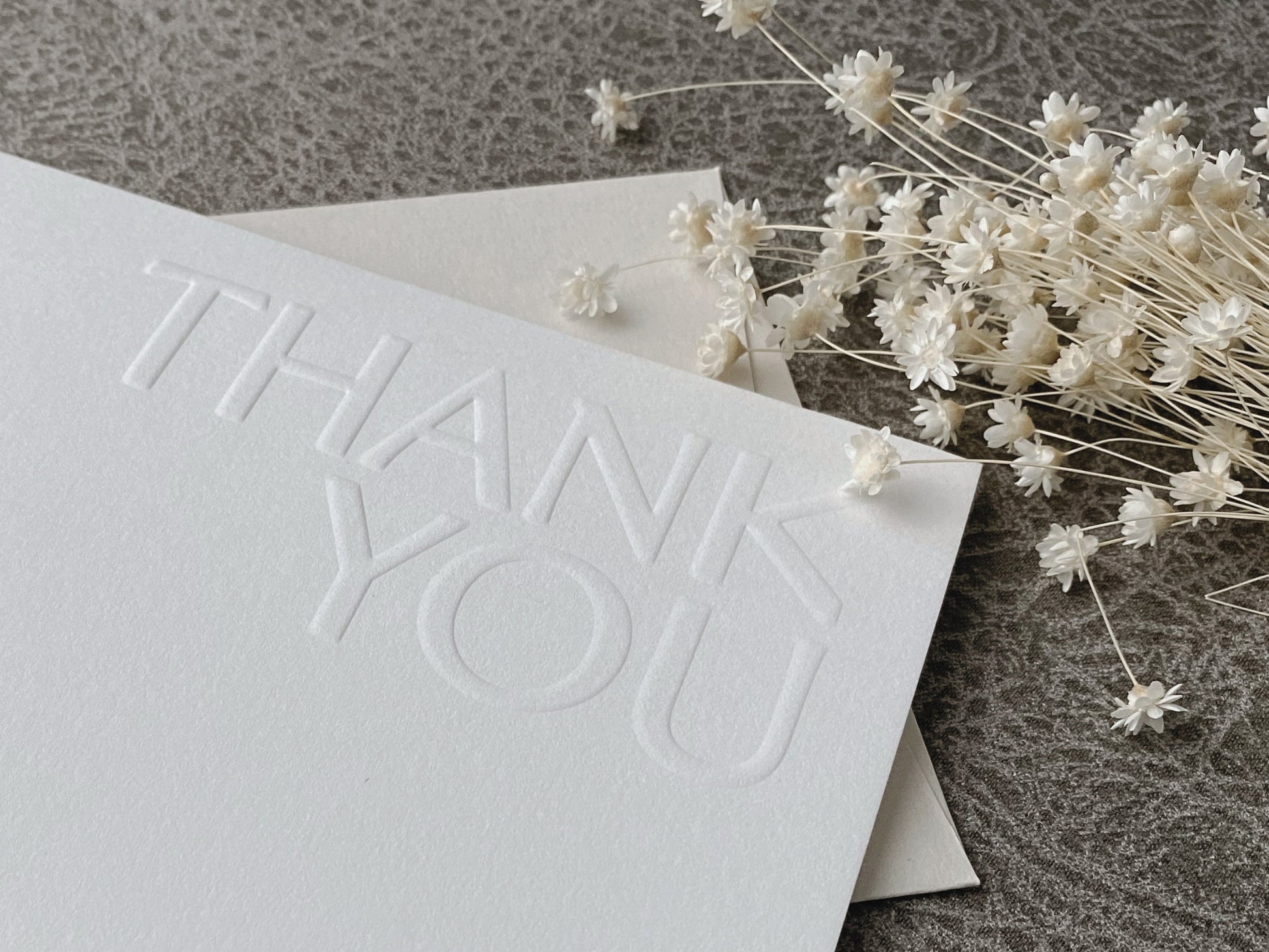 Blind embossed thank you card closle up