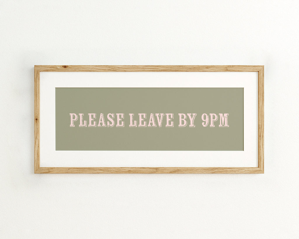 Framed sign with 'PLEASE LEAVE BY 9PM' text on a green background