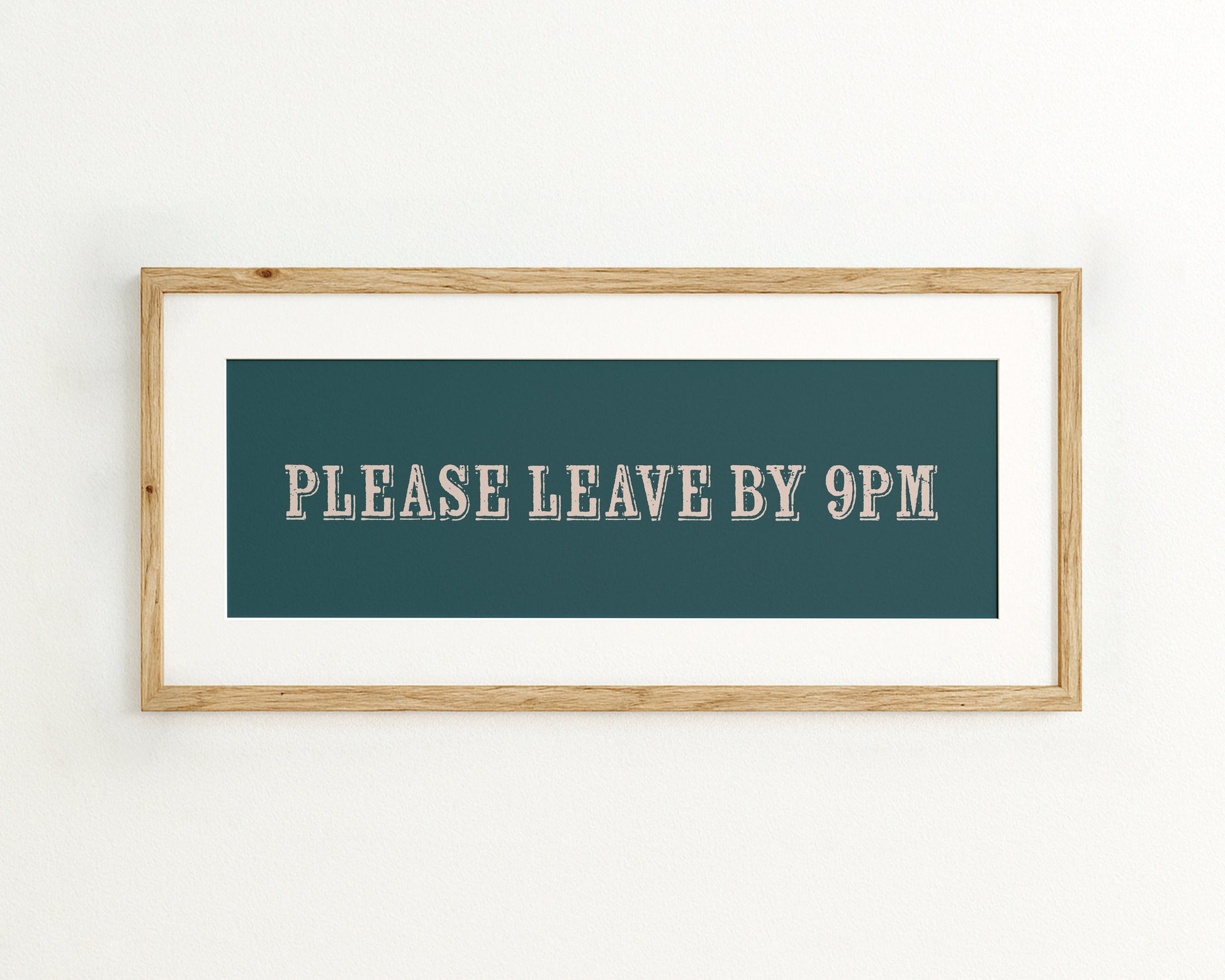 Framed sign with 'PLEASE LEAVE BY 9PM' text on a teal background