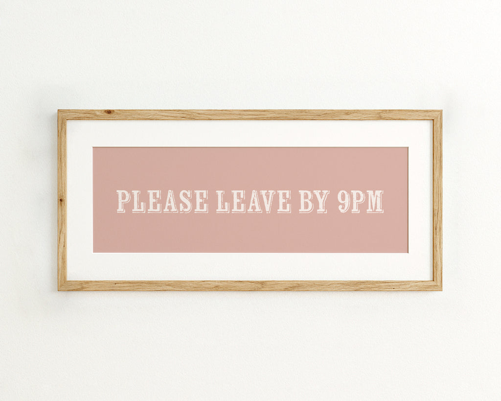 Framed quote 'Please Leave By 9PM' on a pink background