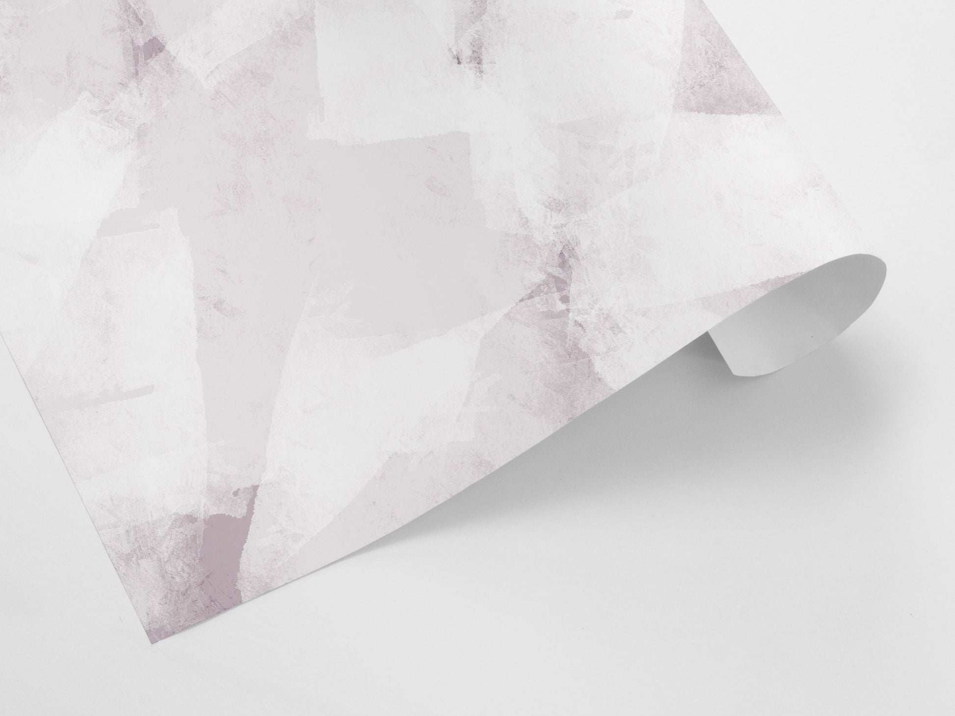 Sheet of pink toned wrapping paper with an abstract ice pattern