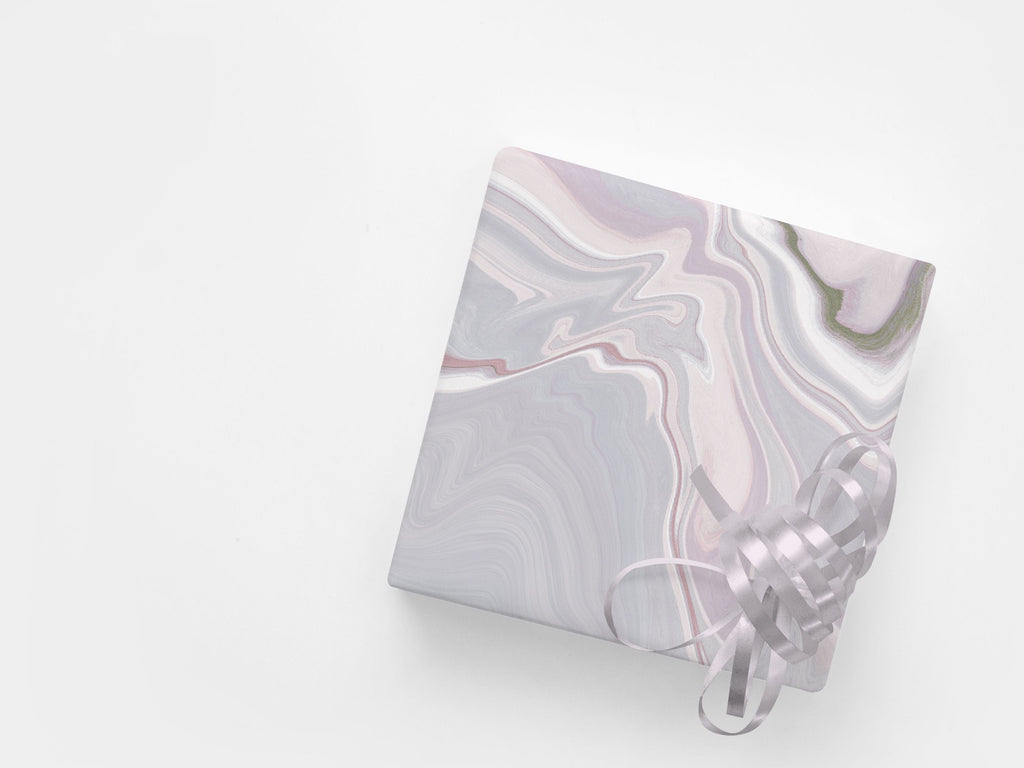 Gift wrapped item with an abstract marble paper design