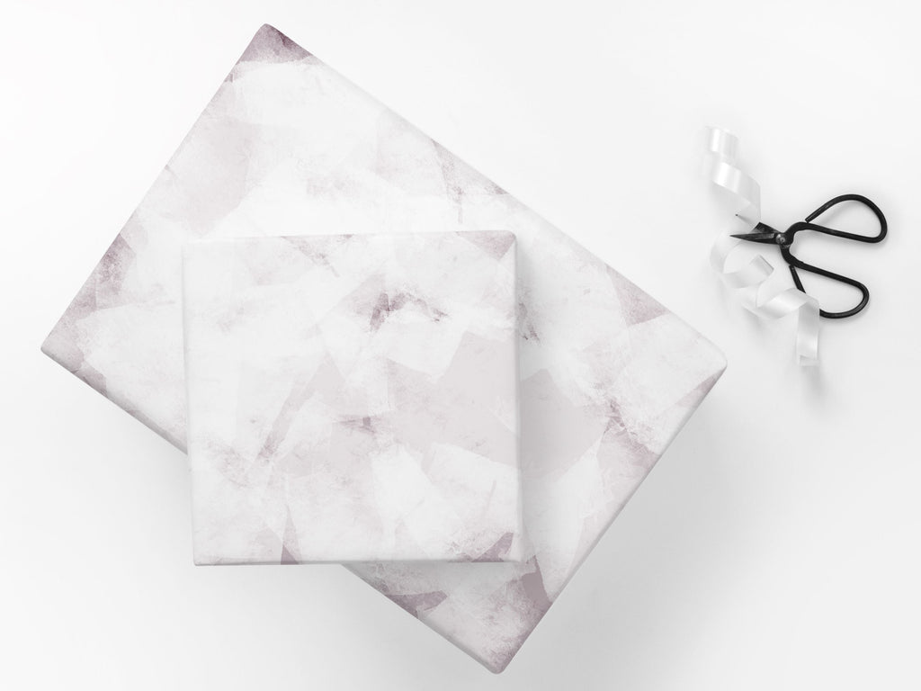 Wrapped presents featuring a contemporary abstract pink design